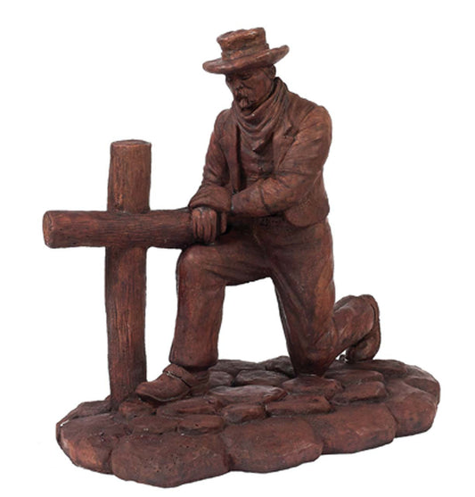 Cowboy Kneeling at Cross